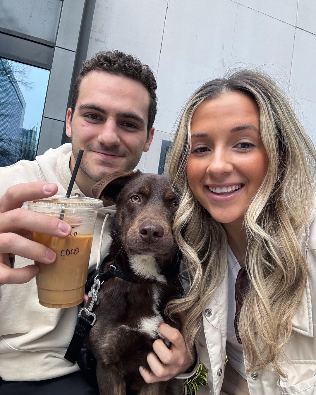 close-up photo of the couple with dog