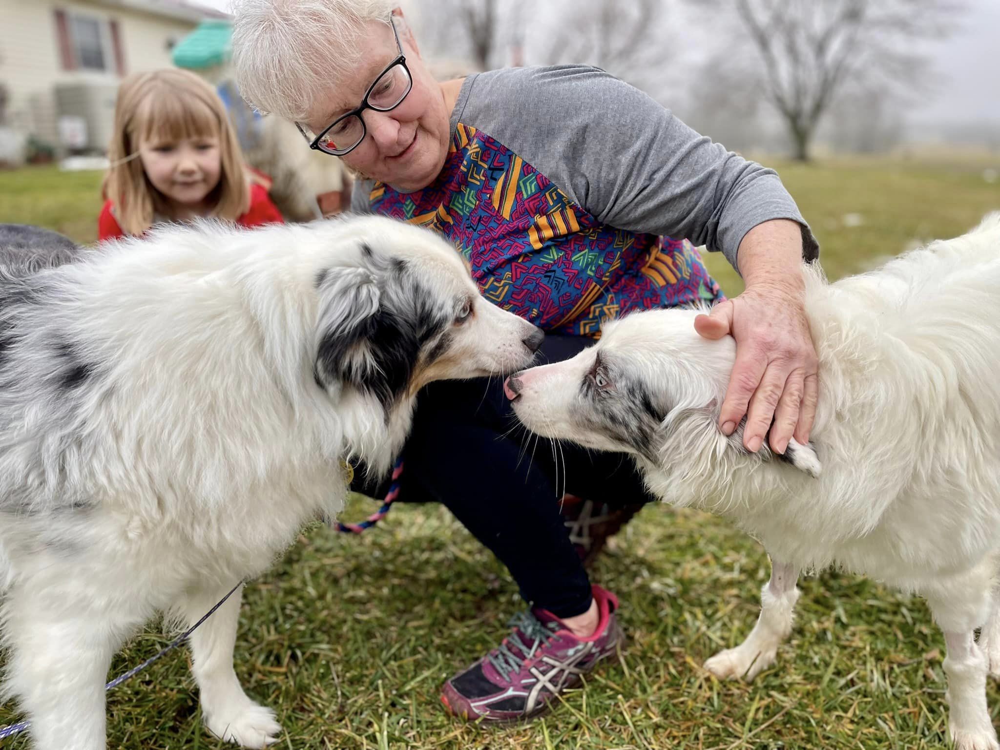 old woman and two dogs