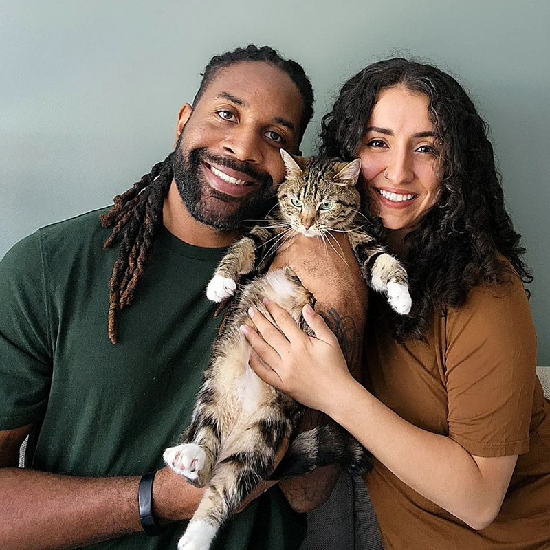 Abdul with Shamiyan and their cat Bambi who helps the foster babies