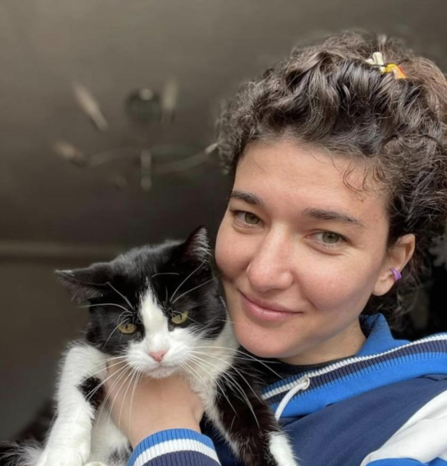 Ukrainian woman hugging cat