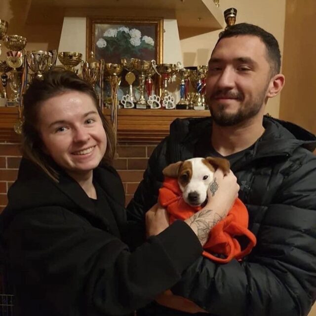 Ukrainian woman with husband and dog