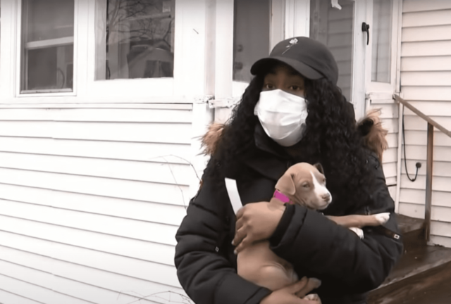 Woman Holding Her Stolen Puppy