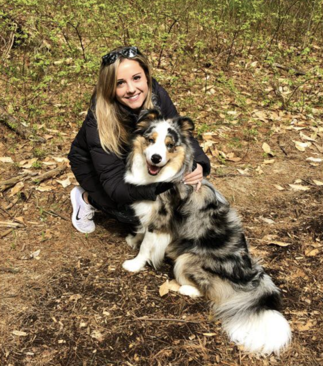 Woman hugging her dog